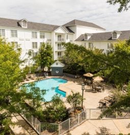 Aerial view of a hotel with swimming pool