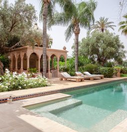 Large multi level pool with beautiful garden backdrop