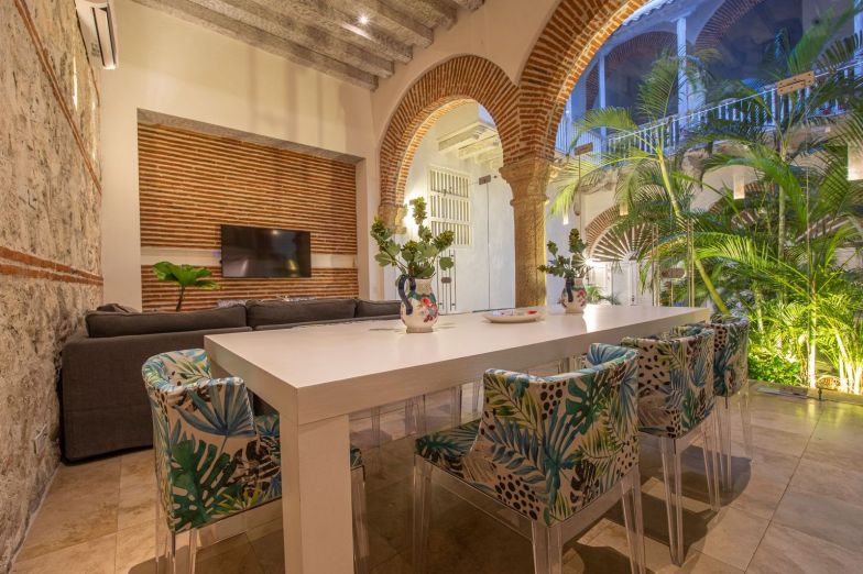 Palm-printed dining area