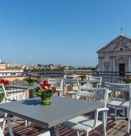 Hotel rooftop terrace with a view of Rome