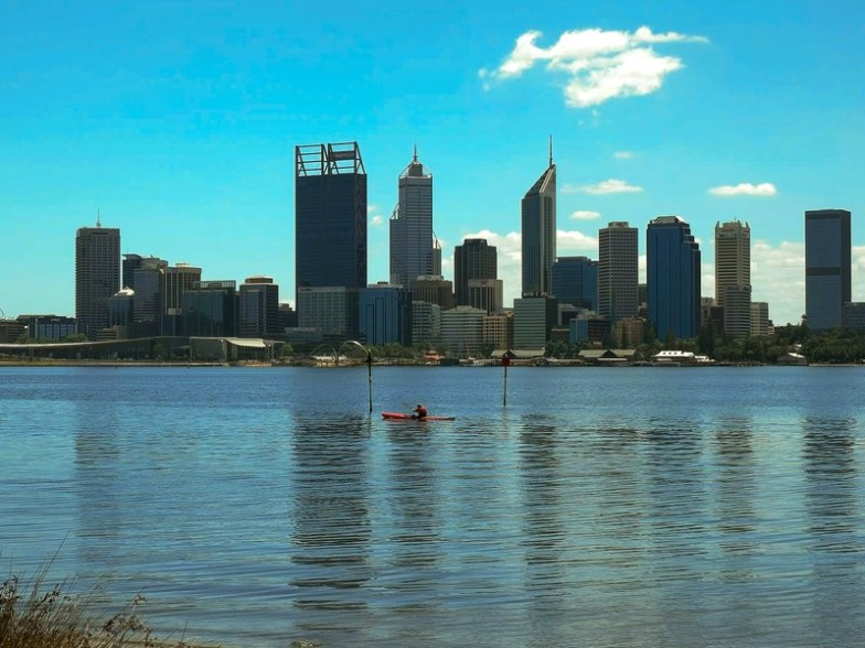 A kayaker enjoys a morning paddle on Western Australia`s Swan River