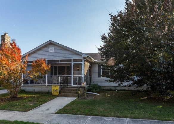 Exterior of home with yard