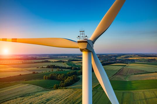 Wind turbine at sunset