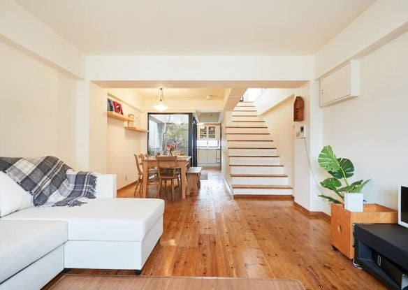 Bright and open living space with wood floor